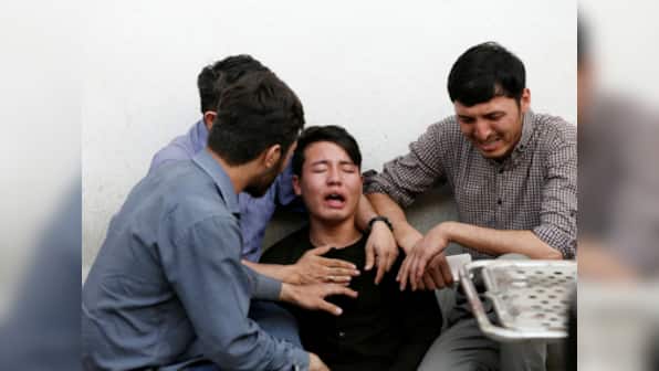 Two attacks in Afghanistan kill 92: Suicide blast in Kabul claims 48 lives; Taliban assault in Baghlan kills 44 policemen