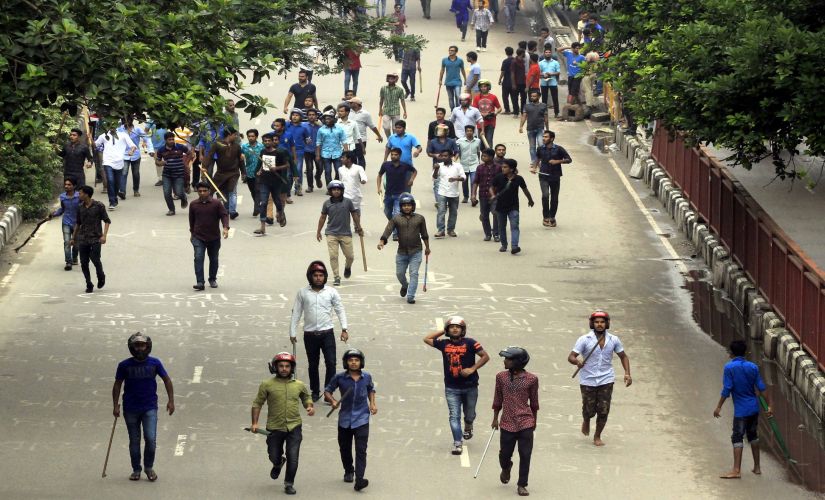 Helmet-wearing men attacked students who had assembled in Jigantola to protest against lack of road safety in Bangladesh. Image procured by Greeshma Rai