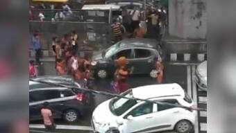 Kanwariyas vandalise vehicle in Delhi's Moti Nagar, after car brushes past them; passengers safe