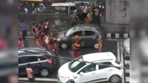 Kanwariyas vandalise vehicle in Delhi's Moti Nagar, after car brushes past them; passengers safe