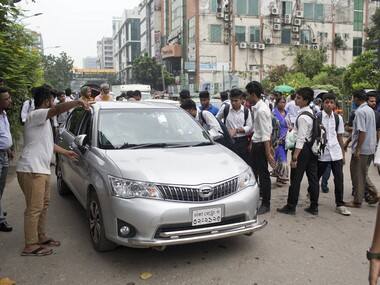 Bangladesh student protests: 'Armed men' attack US envoy's car; Sheikh Hasina asks demonstrators to go home