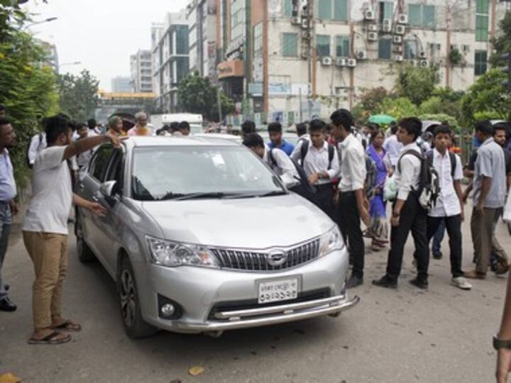 Bangladesh student protests: 'Armed men' attack US envoy's car; Sheikh Hasina asks demonstrators to go home
