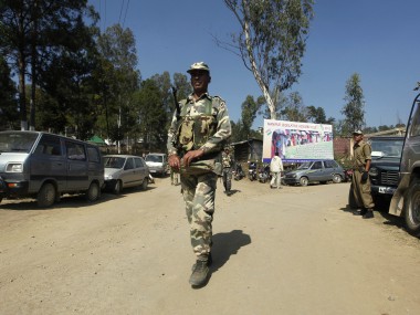 Violence erupts at Manipur University between protesting students, unidentified group; police fire tear gas shells Violence erupts at Manipur University between protesting students, unidentified group; police fire tear gas shells