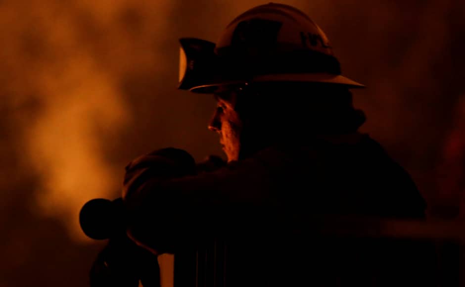 The fire which started on 26 July spread to a canyon below homes on 27 July as crews battled to put it off in the west of Redding city in California. Reuters