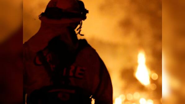 California's Carr wildfire continues to rage, causes another death as it becomes state's destructive six-month-long fire