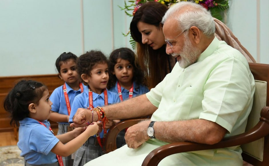 Students from various schools took part in the festivities and tied rakhi on Modi's wrist. Twitter @BJP4India Students from various schools took part in the festivities and tied rakhi on Modi's wrist. Twitter @BJP4India