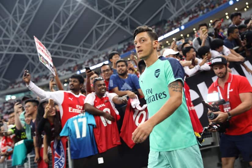 Mesut Ozil takes to the pitch ahead of the game against PSG. International Champions Cup 2018/Getty Images