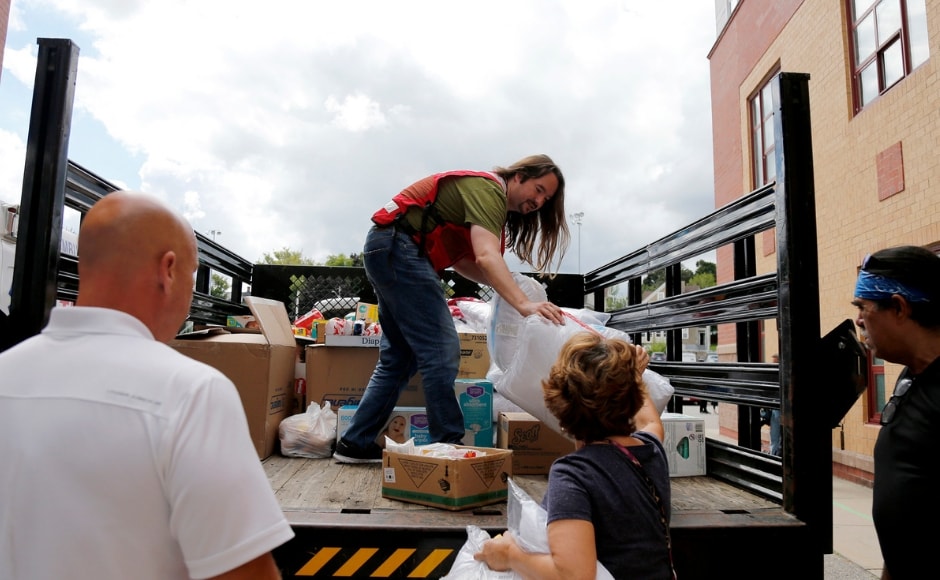 To help the residents with the post-explosions chaos, Red Cross members brought in a truck of donations to waiting volunteers outside the Parthum School in Lawrence, Massachusetts. AP To help the residents with the post-explosions chaos, Red Cross members brought in a truck of donations to waiting volunteers outside the Parthum School in Lawrence, Massachusetts. AP