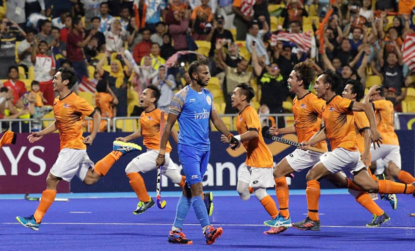 Malaysia’s team jubilate after winning agaisnt India during their men’s hockey semi-final match at the 18th Asian Games in Jakarta, Indonesia, Thursday, Aug. 30, 2018. (AP Photo/Aaron Favila)