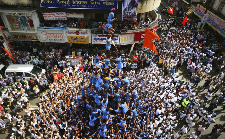 The celebrations began amid strict vigil by personnel from the Mumbai police who were out on roads to ensure compliance of the Bombay High Court's guidelines on the age of participating Govindas (they should not be below 14) and insurance for them. AP The celebrations began amid strict vigil by personnel from the Mumbai police who were out on roads to ensure compliance of the Bombay High Court's guidelines on the age of participating Govindas (they should not be below 14) and insurance for them. AP