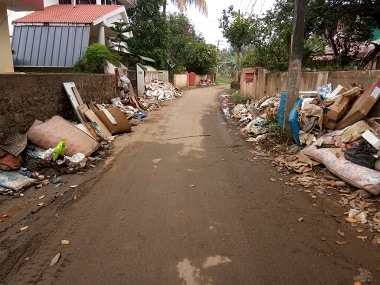 Waste heaped on the roadside in Aluva after the floods in Kerala. Image procured by TK Devasia