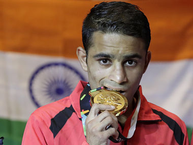 Asian Games 2018: Boxer Amit Panghal beats reigning Olympic and Asian champion Hasanboy Dusmatov to clinch gold Asian Games 2018: Boxer Amit Panghal beats reigning Olympic and Asian champion Hasanboy Dusmatov to clinch gold