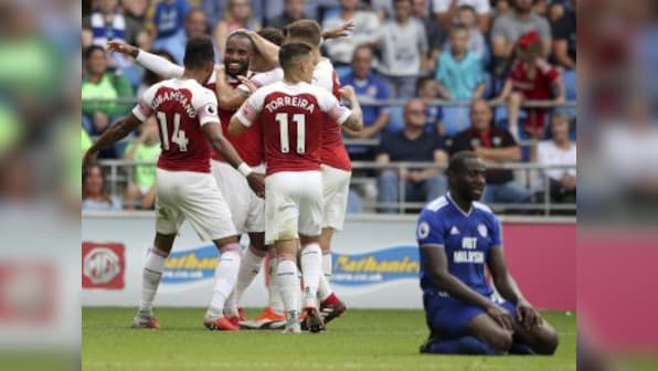 Premier League: Alexandre Lacazette's late winner helps Arsenal see off Cardiff City in five-goal thriller
