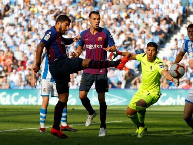 Barcelona's Luis Suarez scores team's first goal. Reuters