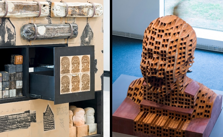 Partha Dasgupta's Recollection of a Manuscript (left), ceramic wooden boards pasted with lithographs and iron fittings are also on display at the Jawahar Kala Kendra along with the terracotta hollow block and cement work by LN Tallur titled Man Exhibiting Holes (right). Indian artists were selected for the exhibition through a nationwide open call and have on display several works that highlight social issues. Partha Dasgupta's Recollection of a Manuscript (left), ceramic wooden boards pasted with lithographs and iron fittings are also on display at the Jawahar Kala Kendra along with the terracotta hollow block and cement work by LN Tallur titled Man Exhibiting Holes (right). Indian artists were selected for the exhibition through a nationwide open call and have on display several works that highlight social issues.