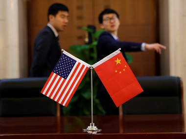 China says new law will bar authorities from demanding overseas companies hand over technology secrets China says new law will bar authorities from demanding overseas companies hand over technology secrets