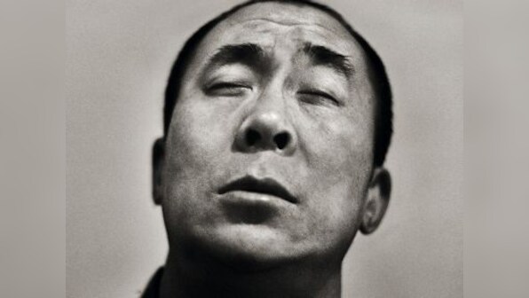 A God in Exile: Photographer Raghu Rai's new book is an intimate portrait of the 14th Dalai Lama