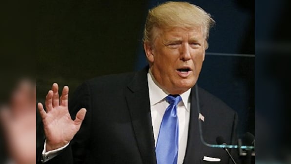 As US midterm elections near, Donald Trump plays high risk political gamble with hardline trade policy; insists he can save US jobs and factories