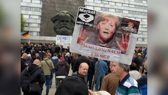 Germany protest: Thousands of supporters, opponents of Angela Merkel's immigration policy demonstrate in Chemnitz city