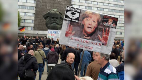 Germany protest: Thousands of supporters, opponents of Angela Merkel's immigration policy demonstrate in Chemnitz city