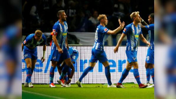 Bundesliga: Hertha Berlin draw level with leaders Bayern Munich at top of table after stunning them in feisty clash