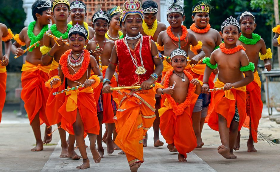 Devotees throng temples to offer prayers to Lord krishna and sing devotional songs during the festival of Janmashtami. Priests and devotees participate in a rally during 'Nagar Sankirton' in Kolkata. PTI Devotees throng temples to offer prayers to Lord krishna and sing devotional songs during the festival of Janmashtami. Priests and devotees participate in a rally during 'Nagar Sankirton' in Kolkata. PTI