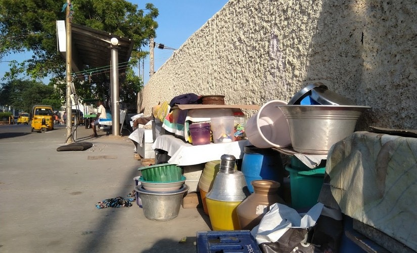 Around a hundred others live along with Mahalakshmi on this stretch of footpath running along the Gandhi-Irwin Road in Chennai. Their belongings line the footpath.