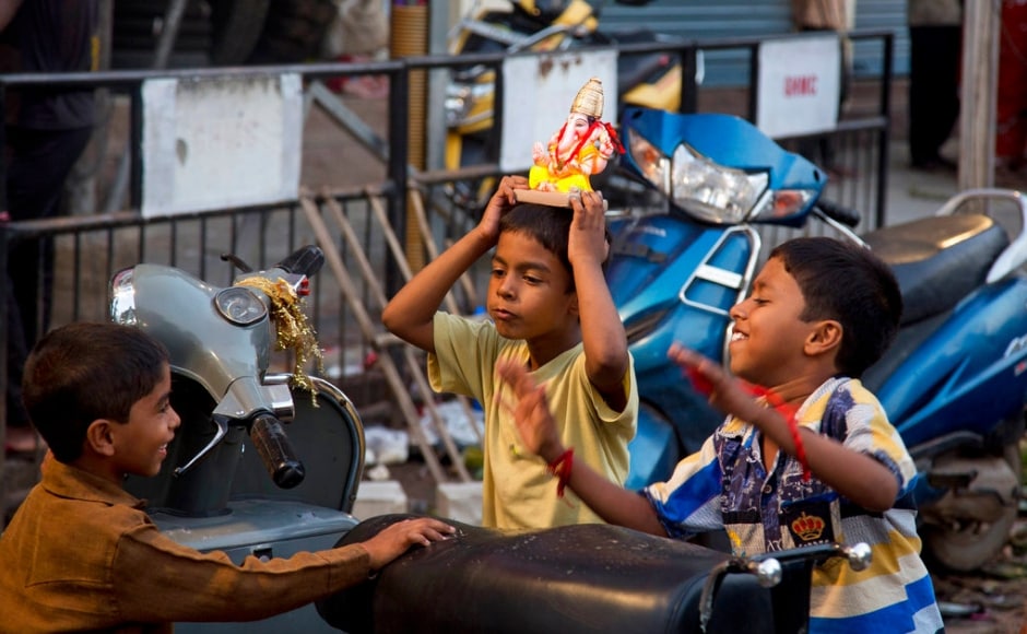 Children in Hyderabad dance with the Ganesha idol on the day of Ganesh Chaturthi. The ten days of the festival are celebrated by thousands, young and old in many parts of the country with great pomp. The Associated Press/ Mahesh Kumar A Children in Hyderabad dance with the Ganesha idol on the day of Ganesh Chaturthi. The ten days of the festival are celebrated by thousands, young and old in many parts of the country with great pomp. The Associated Press/ Mahesh Kumar A