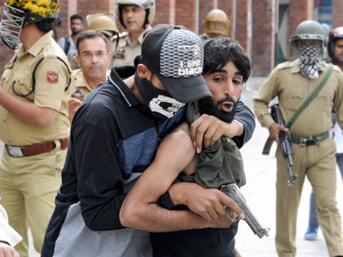 Toy guns, covert cops: Jammu and Kashmir Police plants its men among stone pelters to catch real culprits in action Toy guns, covert cops: Jammu and Kashmir Police plants its men among stone pelters to catch real culprits in action