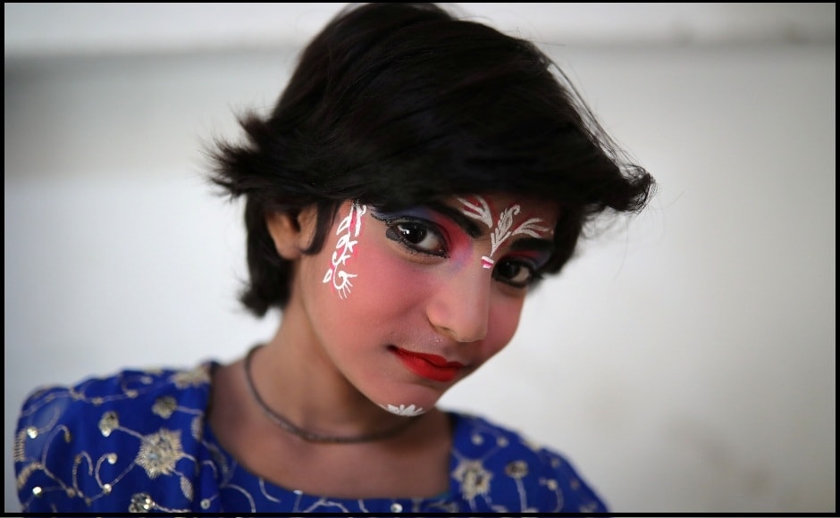 A girl who dressed as Radha in Dhaka on the occasion of Janmashtami which marks the birth of Krishna and falls in the month of Sharavan of the Hindu calendar. Reuters/ Mohammed Ponir Hussain