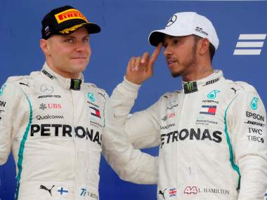 Formula One F1 - Russian Grand Prix - Sochi, Russia - September 30, 2018 Second placed Mercedes' Valtteri Bottas and first placed Mercedes' Lewis Hamilton after the race REUTERS/Maxim Shemetov - RC126D7B8D60