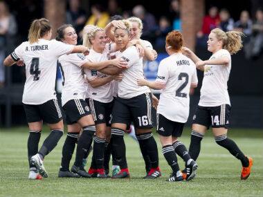 Manchester United’s women’s team celebrates after winning. Twitter: @ManutdWomen