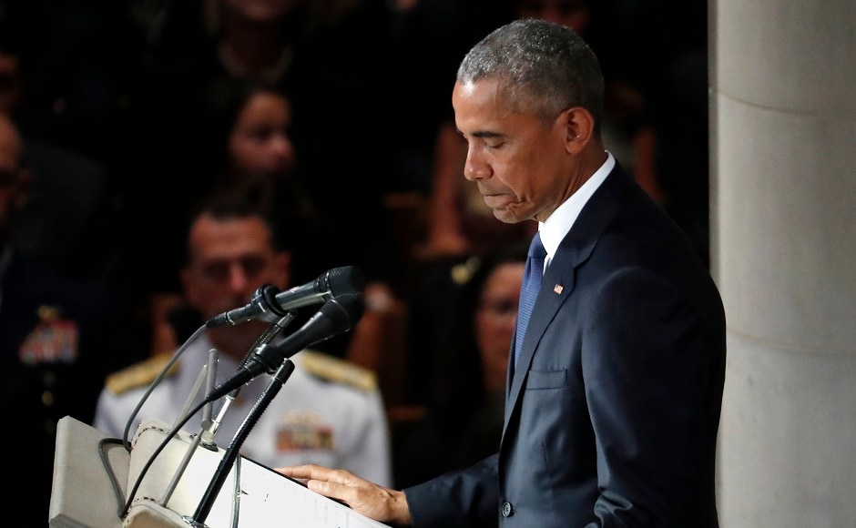 Obama, in his eulogy, hailed the one-time prisoner of war for his commitment to truth and core democratic values. He said that he and McCain "didn't advertise it," but they would meet almost weekly in the Oval Office to talk about policy and also their families. AP