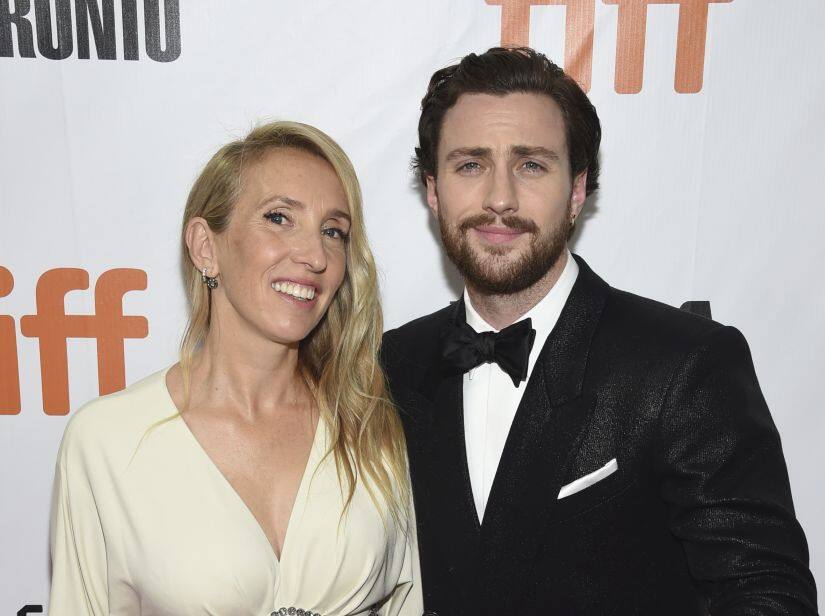 FILE - In this Sept. 6, 2018 file photo, director Sam Taylor-Johnson, left, and her actor husband Aaron Taylor-Johnson attend the gala for 