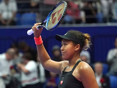Naomi Osaka of Japan celebrates after defeating Barbora Strycova of the Czech Republic after the quarterfinal match of the Pan Pacific Open women's tennis tournament in Tokyo Friday, Sept. 21, 2018. (AP Photo/Eugene Hoshiko)