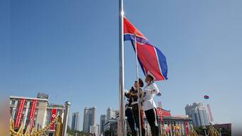 North Korea parades troops, artillery to mark 70th anniversary as nation in Pyongyang; Kim Jong-un, Chinese envoy attend