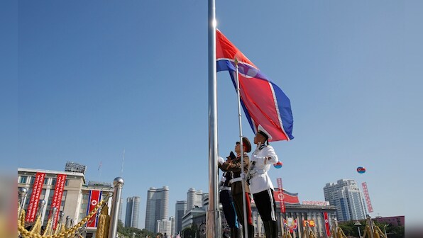 North Korea parades troops, artillery to mark 70th anniversary as nation in Pyongyang; Kim Jong-un, Chinese envoy attend