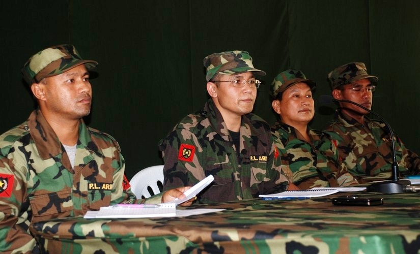 File mage of PLA commander-in-chief Manohar Mayum Pravin Kumar (second from left) announcing the pact with CPI (Maoist) to journalists at a camp in Myanmar on 5 May 2009. Rajeev Bhattacharyya