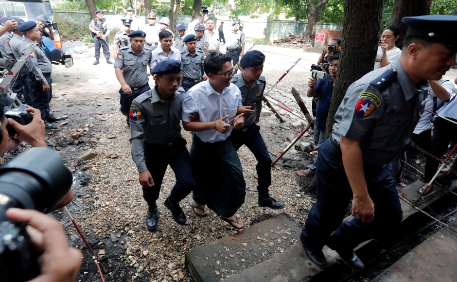 Wa Lone and Kyaw Soe Oo were investigating the killing of villagers from the Rohingya Muslim minority by security forces and civilians when they were arrested in December 2017. They had pleaded not guilty. Reuters Wa Lone and Kyaw Soe Oo were investigating the killing of villagers from the Rohingya Muslim minority by security forces and civilians when they were arrested in December 2017. They had pleaded not guilty. Reuters