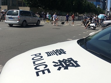 File photo of a Chinese police car, Reuters