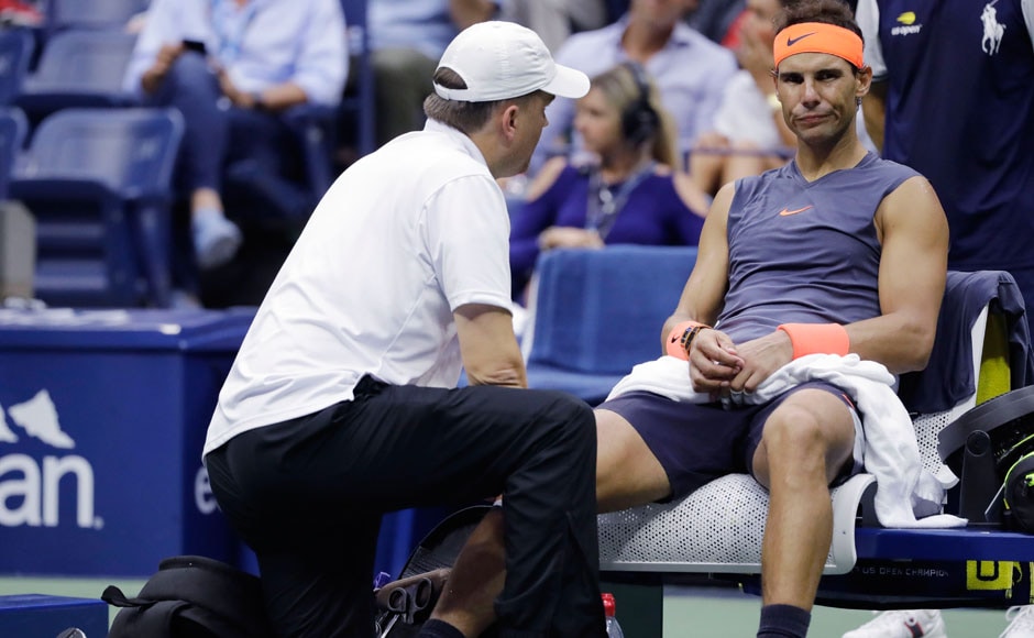 Defending champion Rafael Nadal picked up the injury early on in the first set. Nadal attempted to play through the pain for a while, getting his knee taped up by a physiotherapist on a couple of occasions. Nadal has frequently had knee injuries which have ruled him out for extensive periods. AP Defending champion Rafael Nadal picked up the injury early on in the first set. Nadal attempted to play through the pain for a while, getting his knee taped up by a physiotherapist on a couple of occasions. Nadal has frequently had knee injuries which have ruled him out for extensive periods. AP