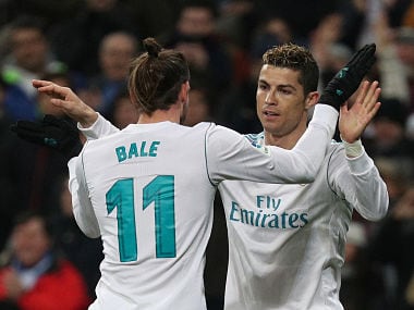 Soccer Football - La Liga Santander - Real Madrid vs Real Sociedad - Santiago Bernabeu, Madrid, Spain - February 10, 2018 Real Madrids Cristiano Ronaldo celebrates scoring their fifth goal to complete his hat-trick with Gareth Bale REUTERS/Sergio Perez - RC16E18A1440