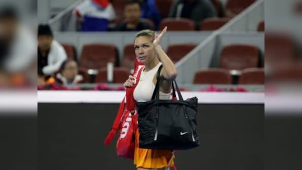 China Open: Simona Halep worried after back injury forces her out; defending champion Caroline Garcia survives scare