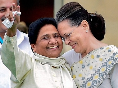 Congress leader Sonia Gandhi and Bahujan Samaj Party leader Mayawati during the swearing-in ceremony of JD(S)-Congress coalition government in Bengaluru. PTI