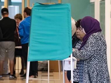 Two women vote in Malmo, Sweden on Sunday. AP