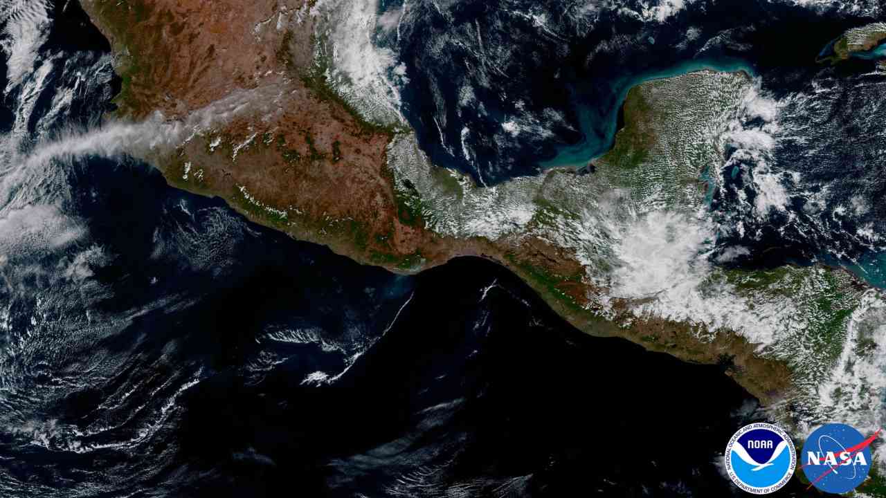 The area of Mexico and Central America pictured from NASA satellite GOES 16 appears largely cloud-free, minus the smoke clouds near the coast from a recent fire. Flickr