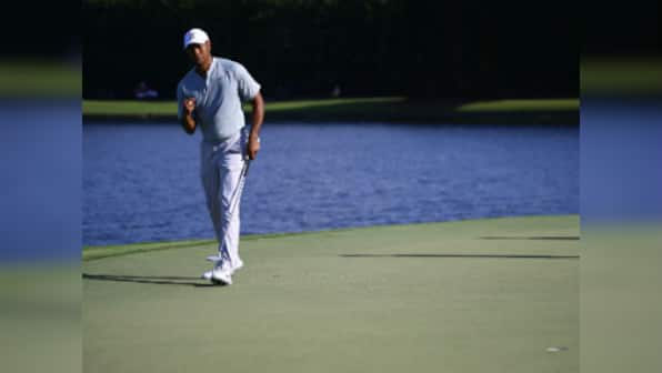 FedEx Cup: Tiger Woods shares lead with Justin Rose in Tour Championship at halfway stage; Rory McIlroy still in contention