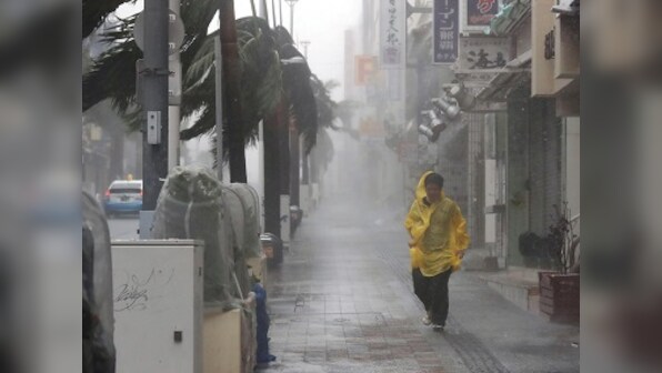 Two dead, 120 injured as Typhoon Trami hits flood-battered Japan; storm's aftermath brings chaos to travel in Tokyo