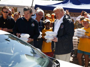 Donald Trump visits areas affected by Hurricane Florence, vows '100 percent' support for storm-battered Carolinas Donald Trump visits areas affected by Hurricane Florence, vows '100 percent' support for storm-battered Carolinas
