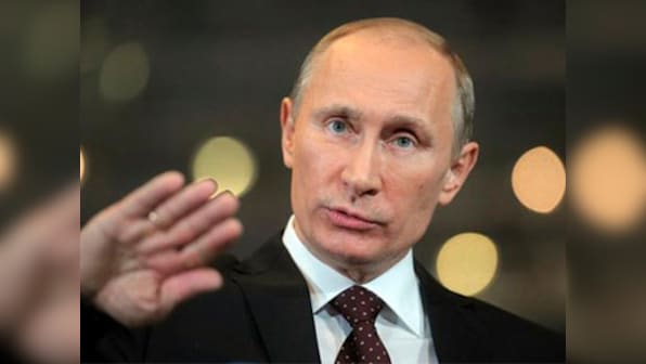 UK security minister says Russian president 'ultimately' responsible for nerve agent attack on former spy
